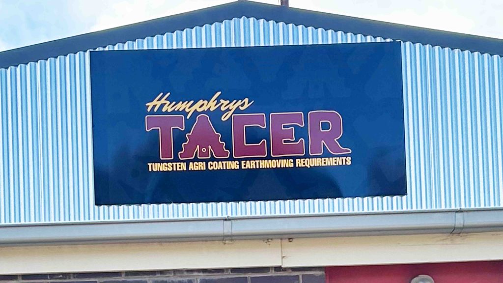 Tacer facia signage